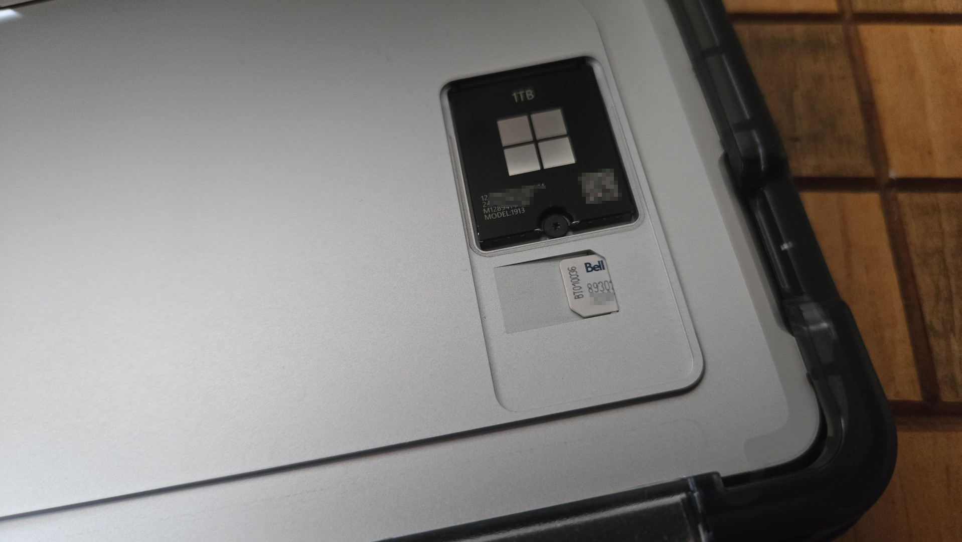 The hidden SIM card slot on a Microsoft Surface Pro with 5G