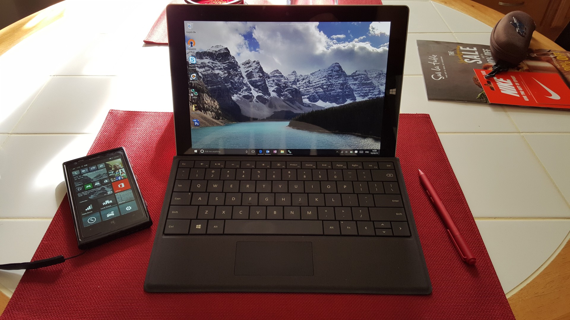 One of my first Surface devices in 2015, as evidenced by a now-defunct Windows Phone next to it